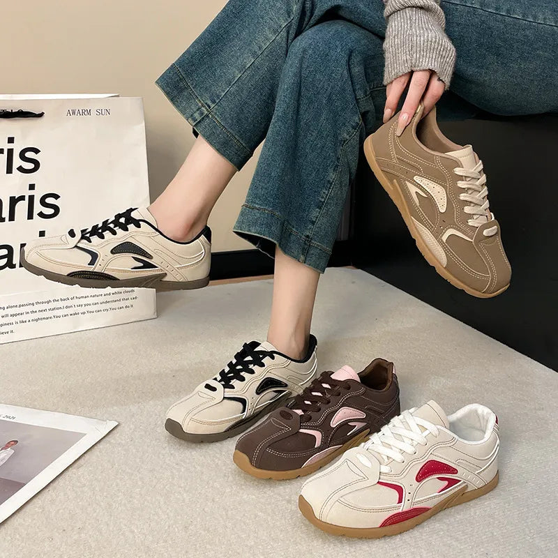 Retro Runner Panel Sneakers in Red, Blush Pink, Black, and Camel with contrast stitching.