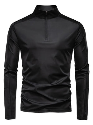 Black performance zip-neck tee with structured shoulders and long sleeves.