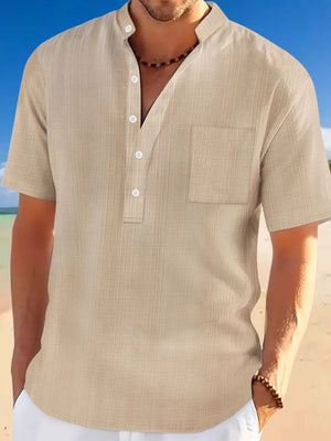 Khaki textured linen henley shirt with mandarin collar and chest pocket.