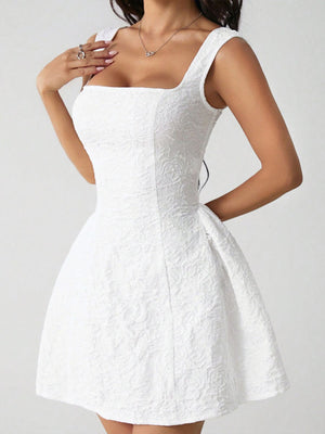 White textured square neck mini dress with a-line skirt and fitted bodice.