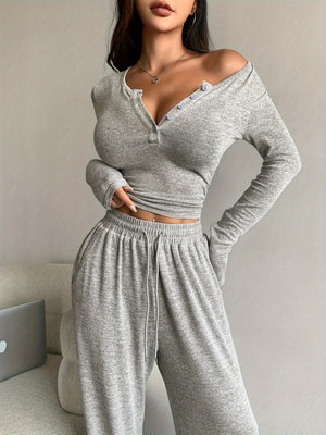 two-piece set in Gray with buttoned and cropped top, full-length pants