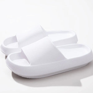 White textured cloud slides slippers with thick soles and breathable design