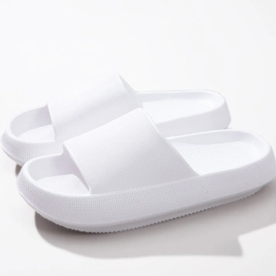 White textured cloud slides slippers with thick soles and breathable design