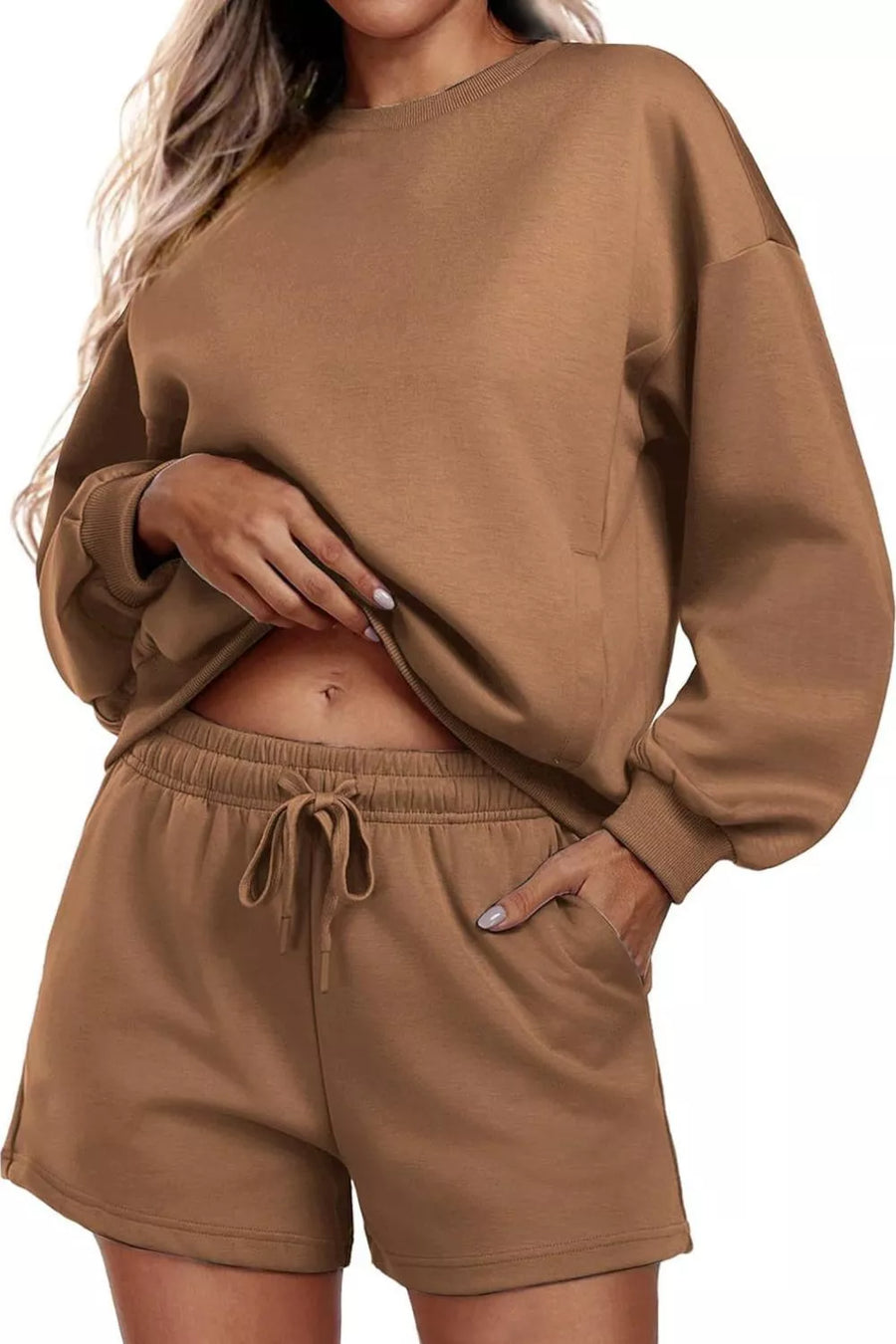 Cozy two-piece sweatshirt set in caramel with drawstring shorts and crewneck sweatshirt.
