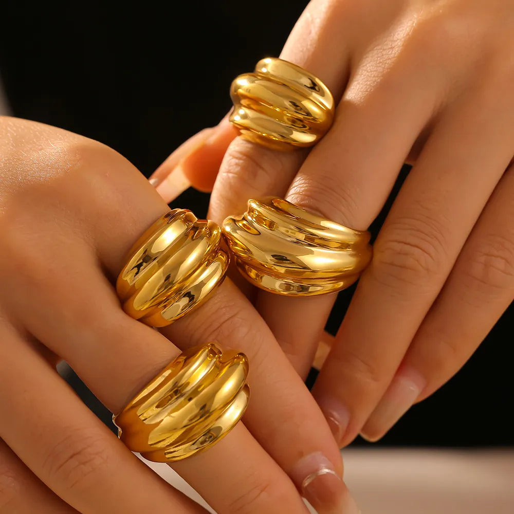 Sculpted gold ridge ring with textured bands, 18K gold-plated.