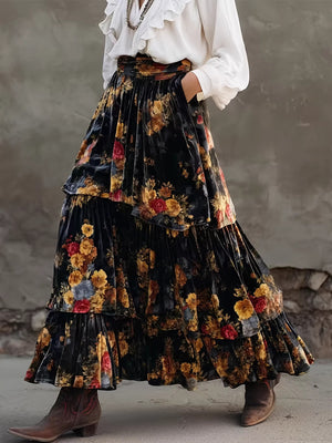 maxi skirt in black featuring tiered and flared fit