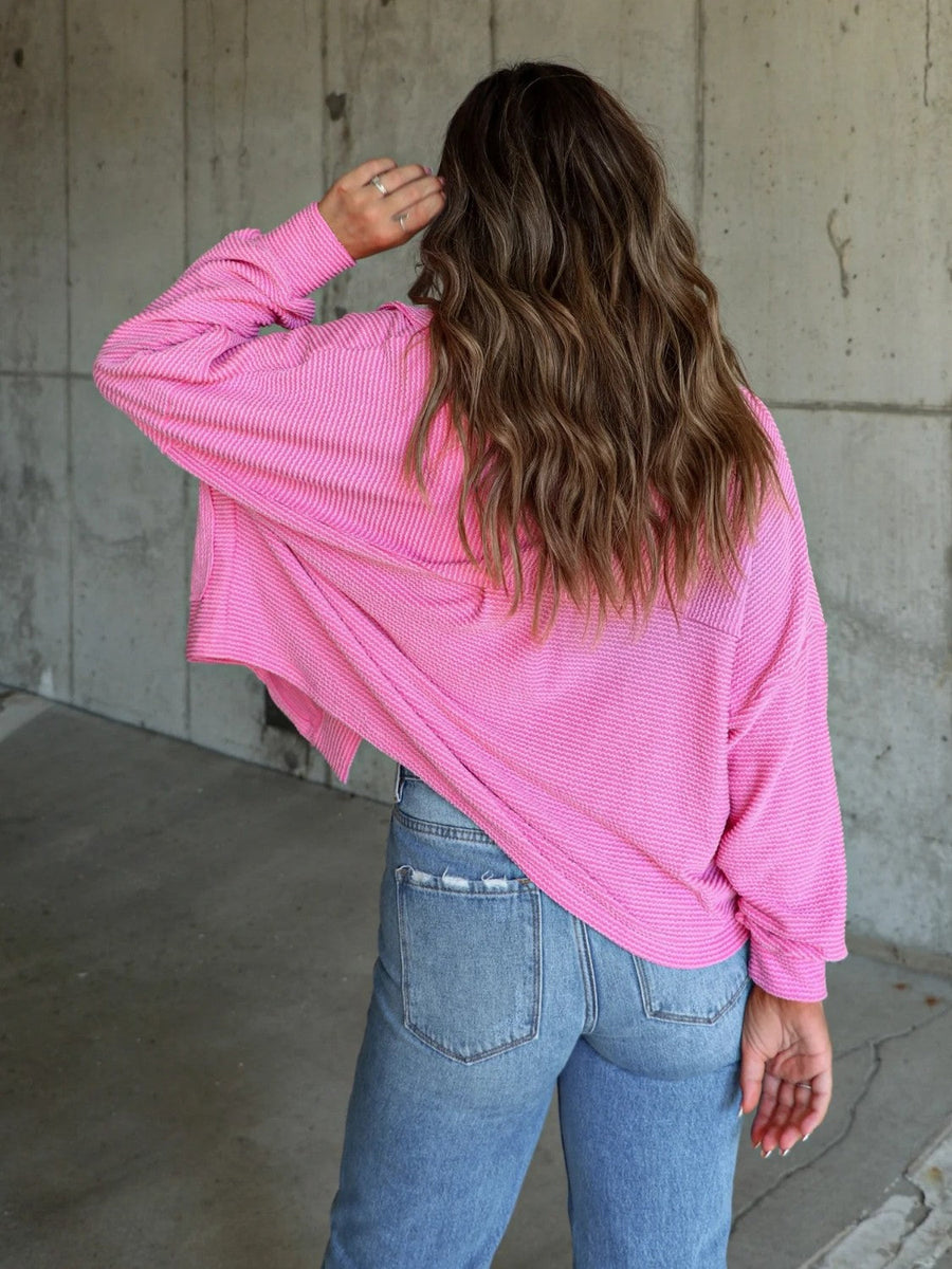 Textured boxy utility shirt jacket in Fuchsia Pink with a subtle stripe pattern.