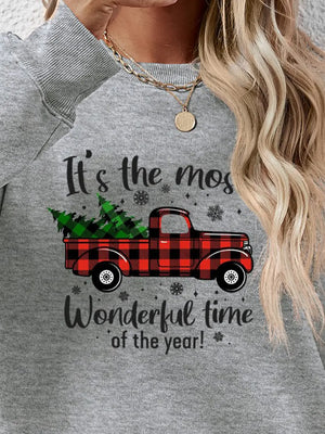 Grey sweatshirt with buffalo plaid truck graphic and holiday text
