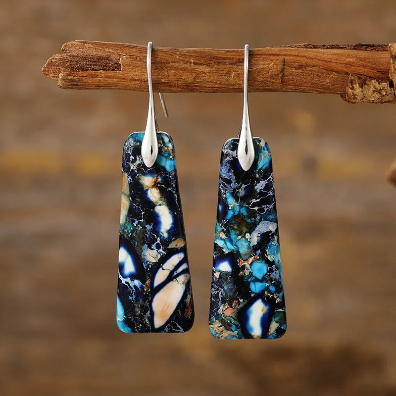 Textured stone drop earrings in navy/silver with unique marbled pattern and silver hooks.