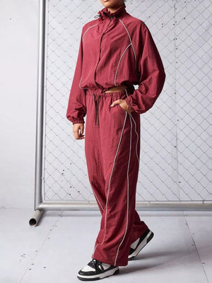 100% polyester Care instructions: Machine wash cold tracksuit in Orange Red with relaxed silhouette