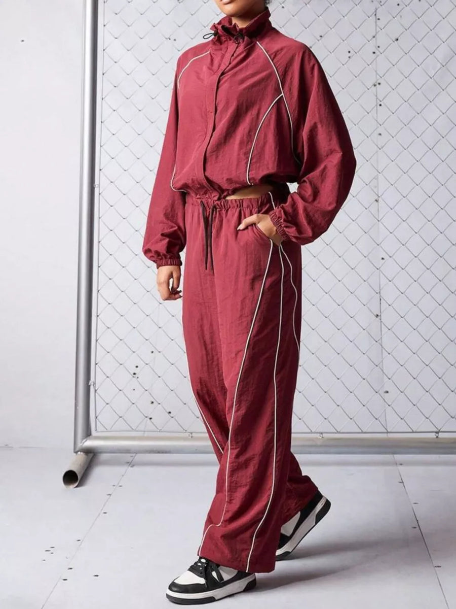 100% polyester Care instructions: Machine wash cold tracksuit in Orange Red with relaxed silhouette