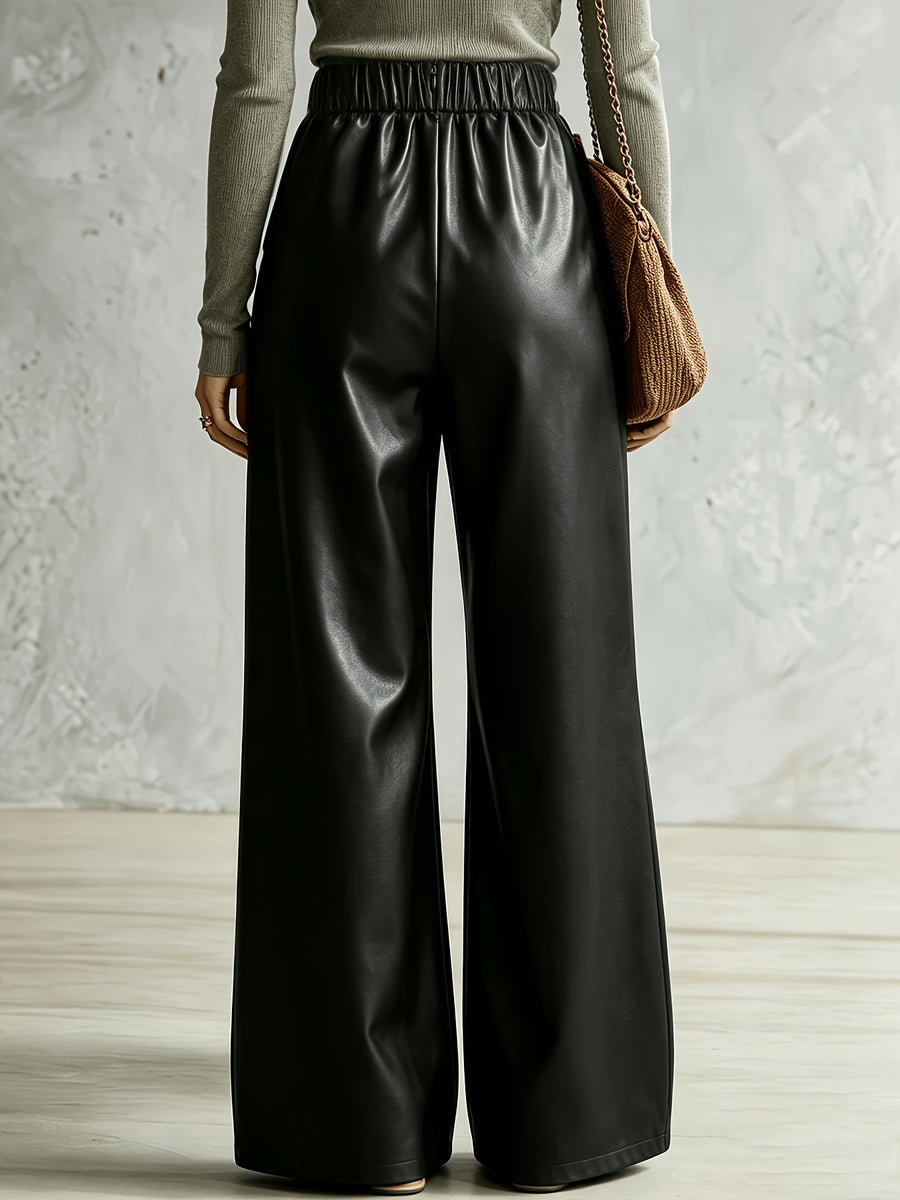 wide-leg pants in Black with seam detail and full-length