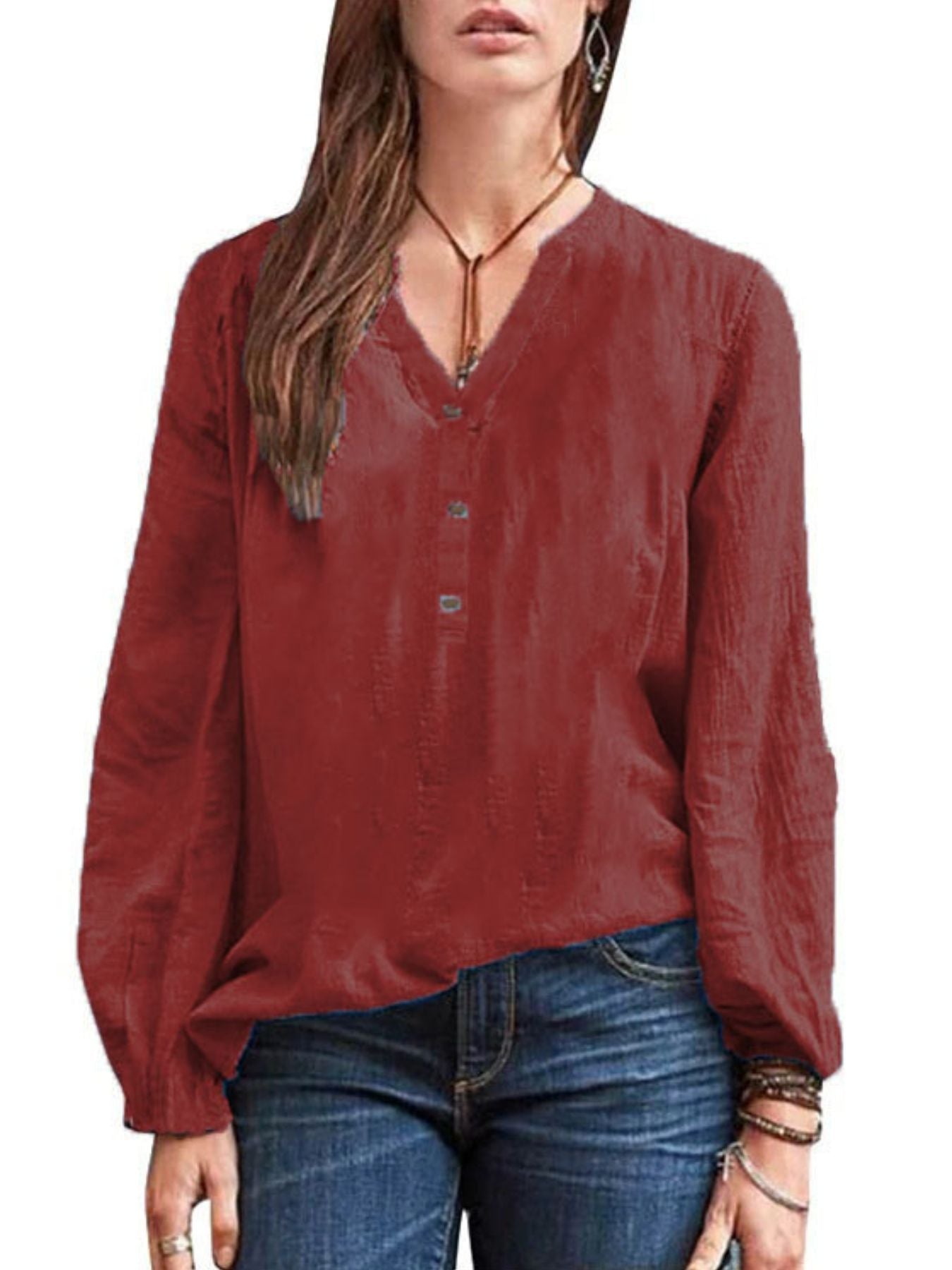 Burgundy long-sleeve blouse with notched neckline and button detail