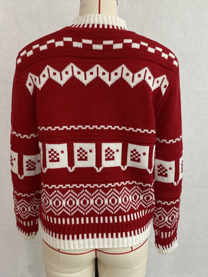 Red crewneck sweater with ribbed cuffs and long sleeve