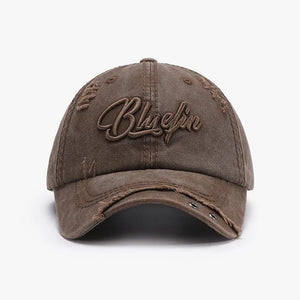 Chocolate cotton baseball cap with distressed details and embroidered text
