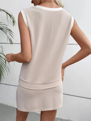 Light Khaki ribbed knit sleeveless top and skort set with a curved hem detail.