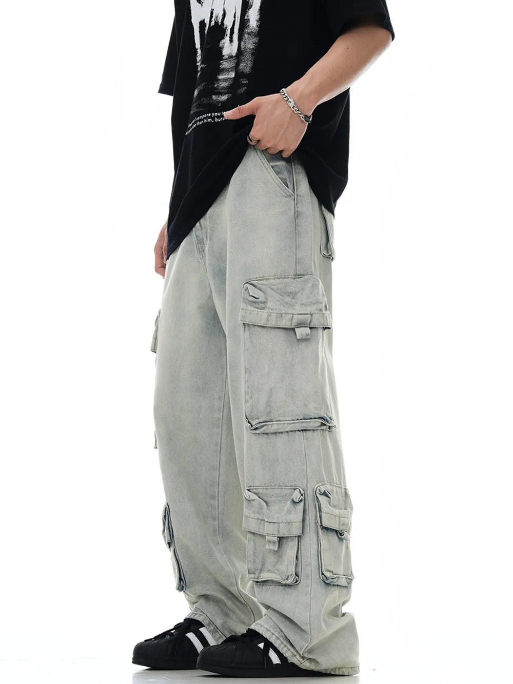 Relaxed fit light blue denim cargo trousers with multiple pockets.