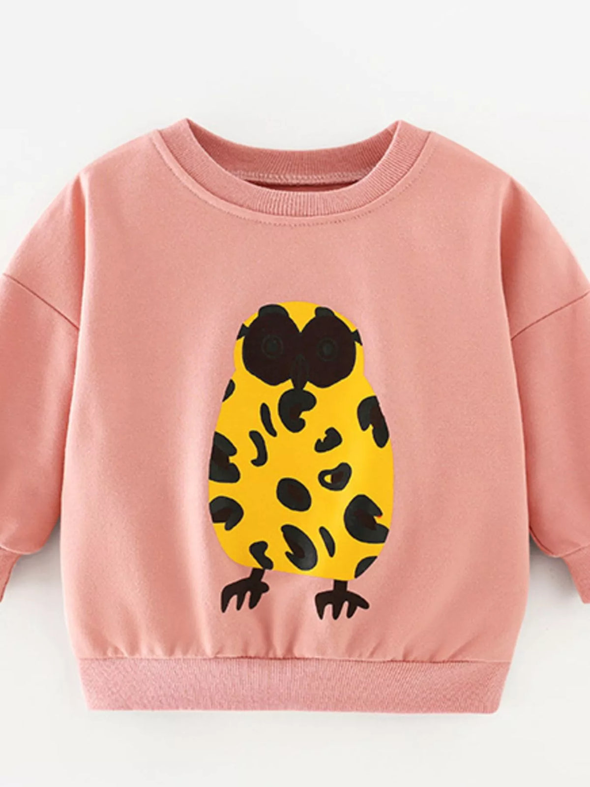Dusty pink cotton sweatshirt for baby with a yellow owl graphic.