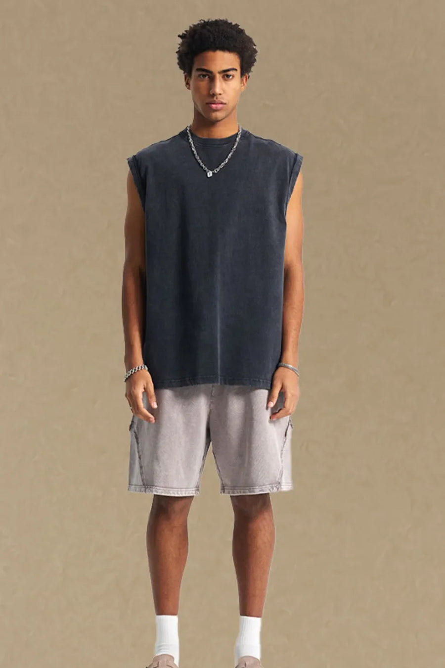 Black washed cotton muscle tee with relaxed fit and crew neck.