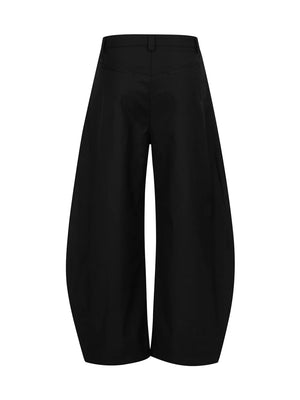 Voluminous wide-leg black sweatpants with a balloon silhouette.