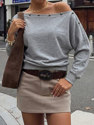 light gray off-shoulder top with hip-length and pullover