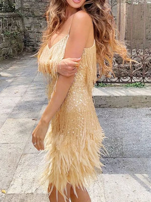 Gold sequin mini dress with fringe and feather trim, spaghetti straps, V-neck