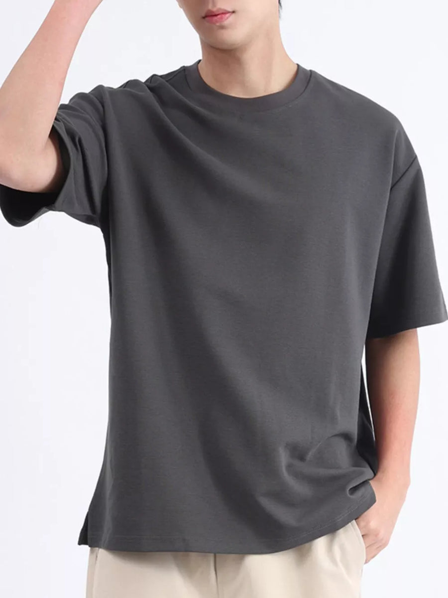 Men's dark gray cotton round neck t-shirt with short sleeves and a relaxed fit.