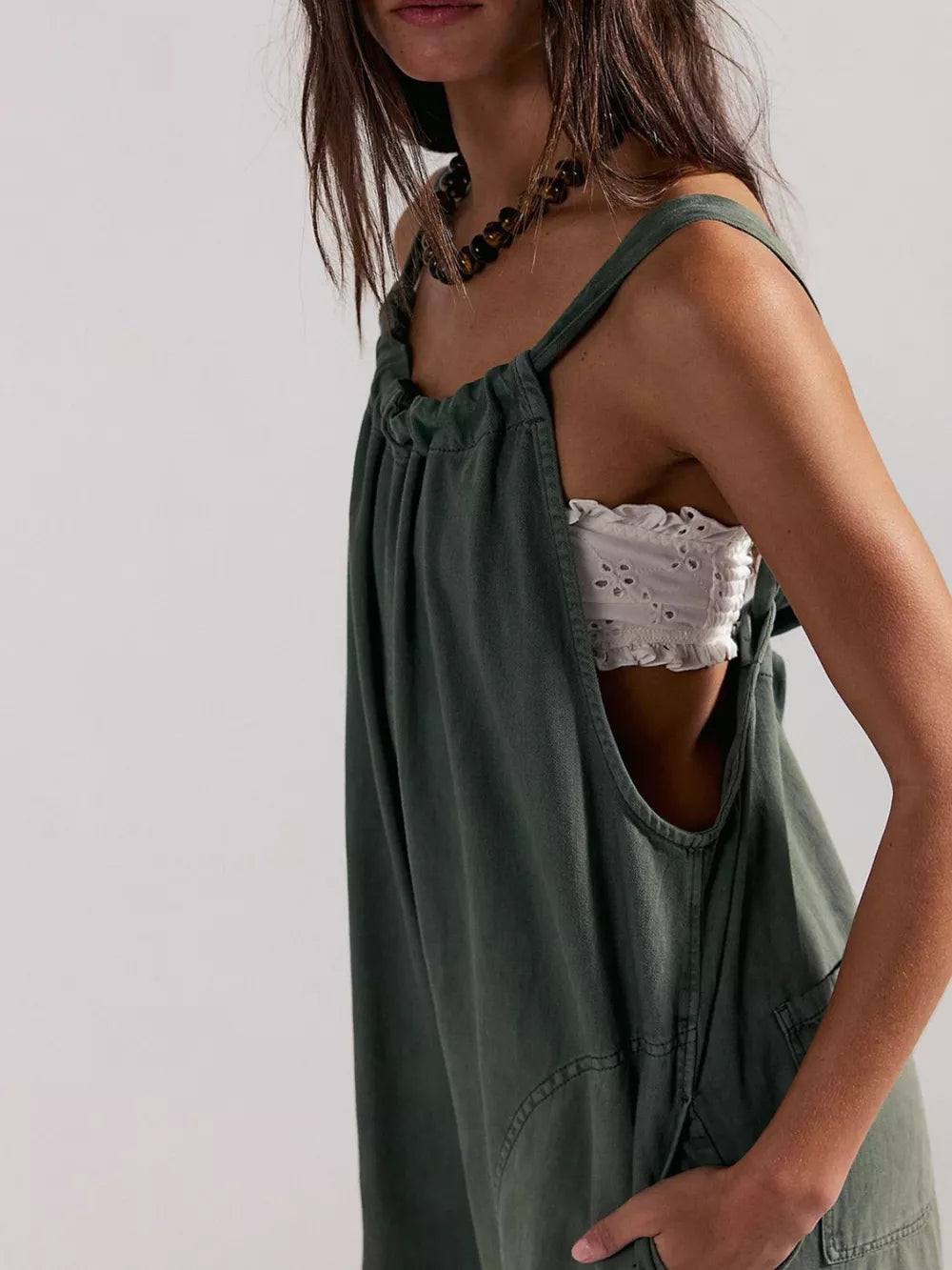 100% polyester Care instructions: Machine wash cold jumpsuit in Dark Brown with loose silhouette