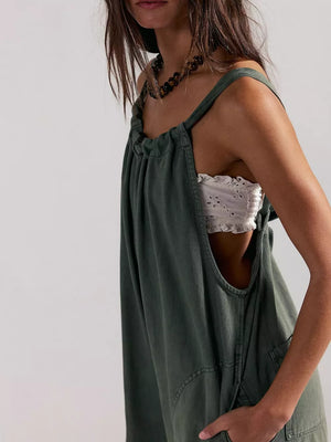 100% polyester Care instructions: Machine wash cold jumpsuit in Dark Brown with loose silhouette