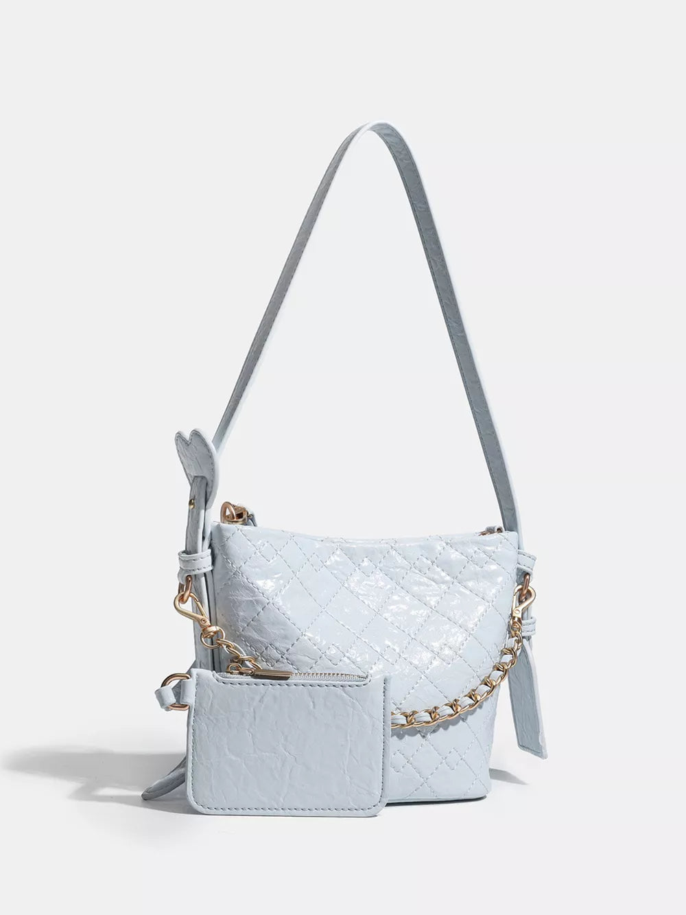 Chic quilted bucket bag in light blue with gold chain accent and matching coin purse.