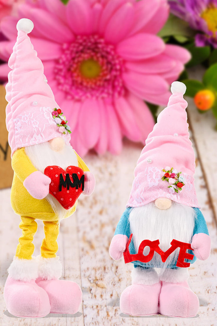 Embroidered gnome with pink hat holding red heart, and gnome with blue shirt holding red LOVE sign.