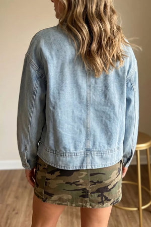 Light wash denim trucker jacket with draw-cord hem detail