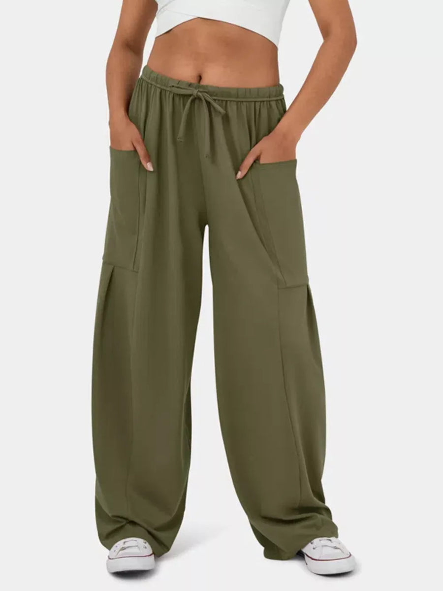 Army green maternity pants with drawstring waist and cargo pockets.