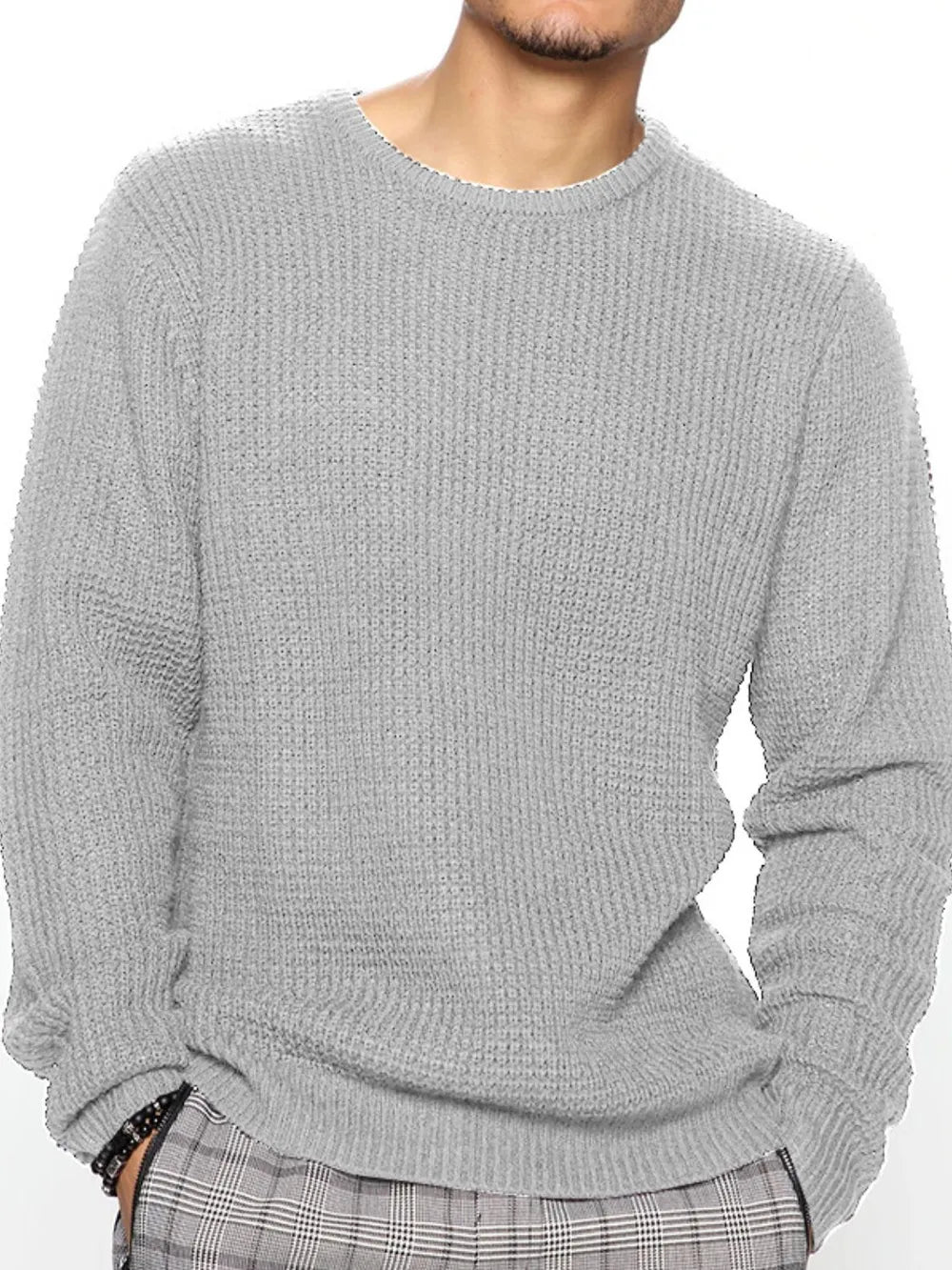 Gray waffle knit crewneck sweater with relaxed fit and long sleeves.