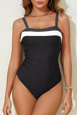 Black one-piece swimsuit with removable padding and sleeveless