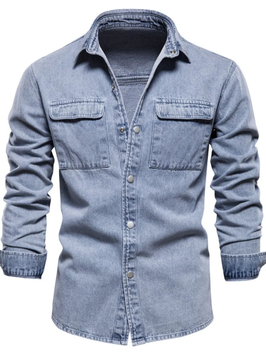 Light faded denim utility shirt jacket with two chest pockets and button front.