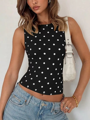 Black polka dot cropped tank top with ruffled detail and crew neck.