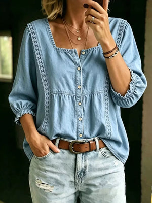 button-down shirt in light blue featuring button-front and relaxed fit