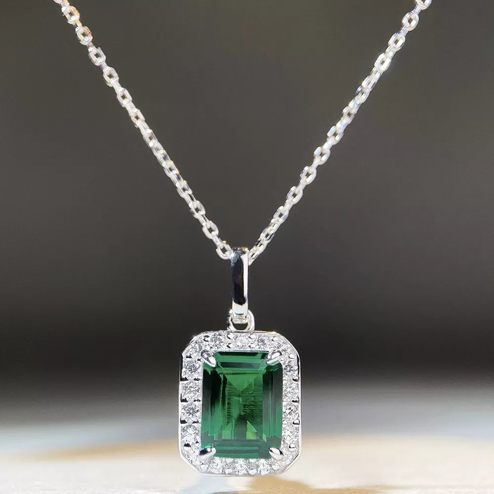 emerald green necklace featuring zircon embellishment and geometric
