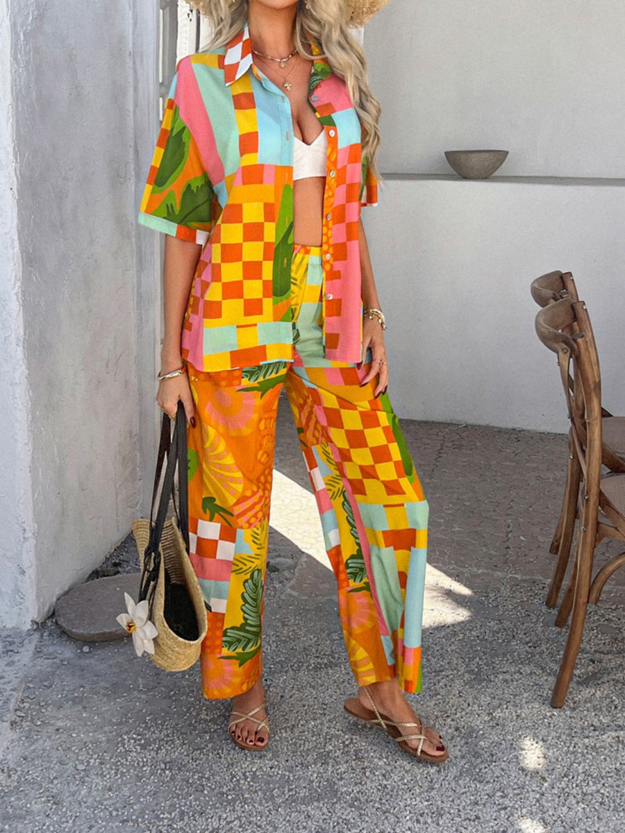 Women's multicolor abstract print resort co-ord set with button-down shirt and wide-leg pants.