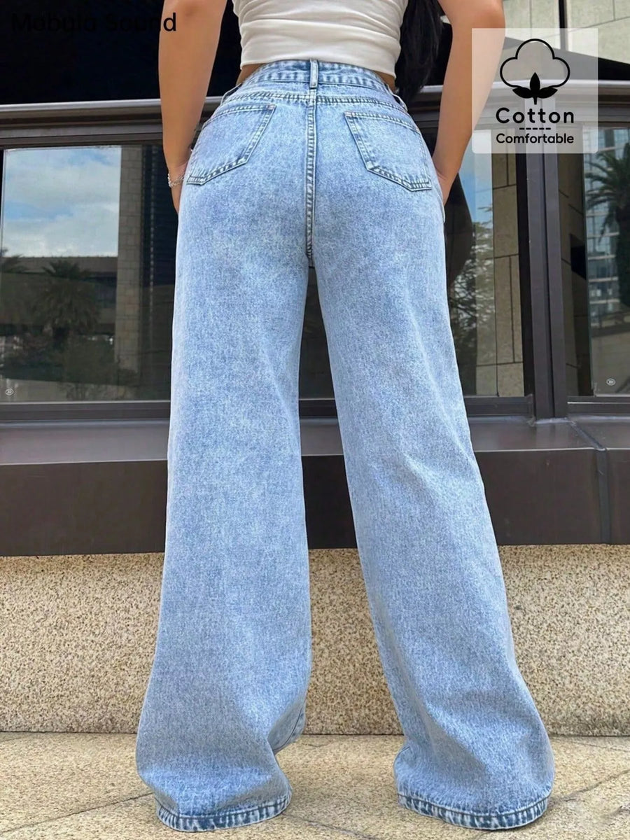 Blue denim wide-leg jeans with pockets and a comfortable cotton blend fabric.