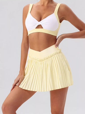 80% Nylon, 20% Spandex Care instructions: Machine wash cold activewear in Pastel Yellow with fitted silhouette