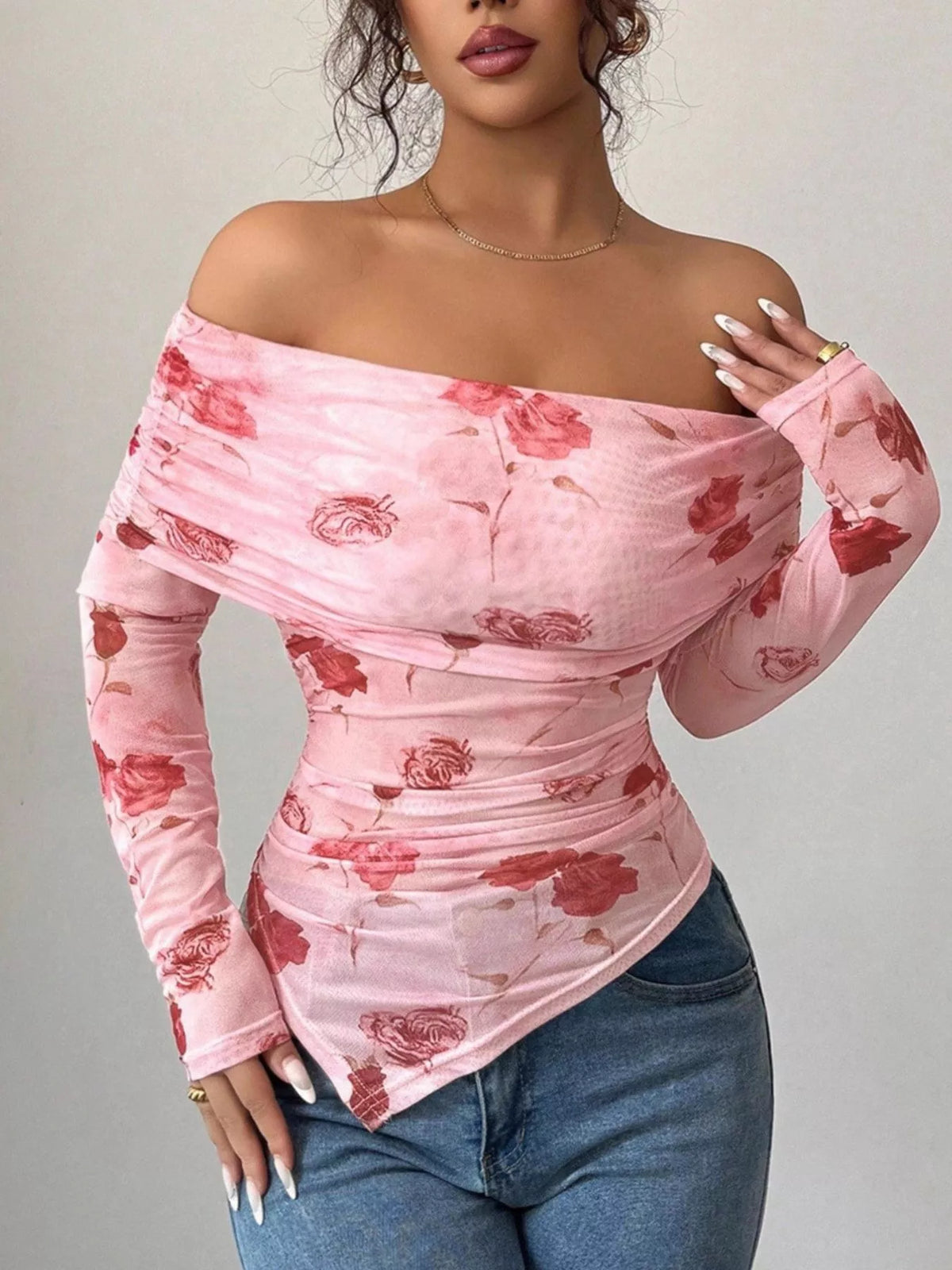 Pink floral mesh off-shoulder ruched top with long sleeves.