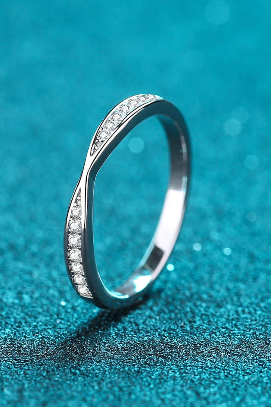 Silver twisted pavé band ring with clear stones