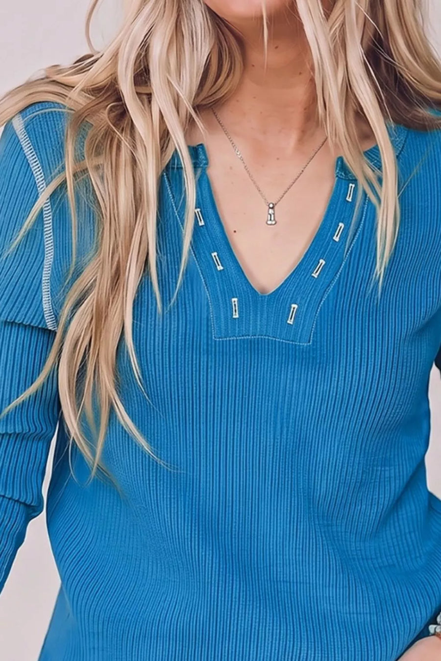 96% viscose, 4% elastane Care instructions: Machine wash cold henley in teal blue with slim silhouette