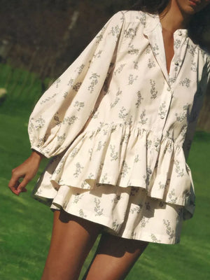 Cream floral print mini dress with puff sleeves and tiered ruffle skirt