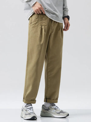 Men's olive relaxed fit sweatpants with drawstring and pockets.