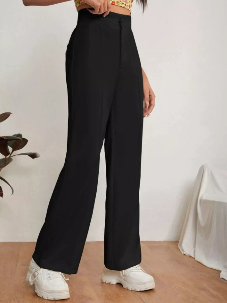 Black high-waisted maternity pants with clean lines and a center seam.