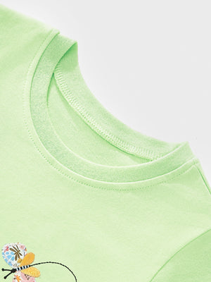 Toddler light green short sleeve tee with a butterfly applique and cartoon bunny detail.