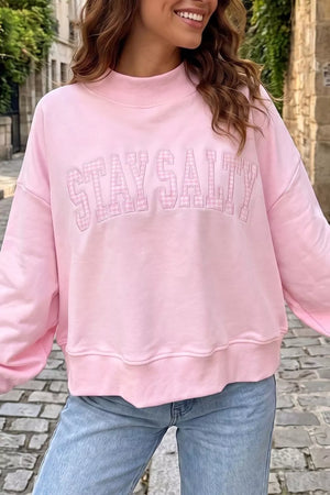 sweatshirt in light pink featuring embroidered and relaxed fit
